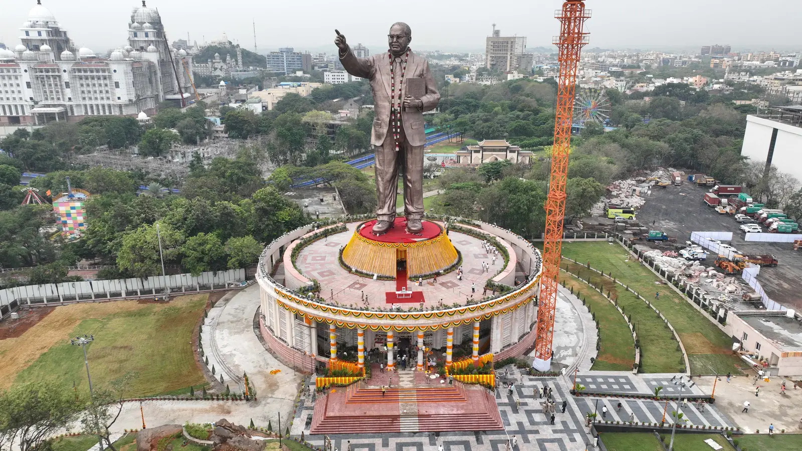 Hyderabad, 14 April 2023. The 125-foot bronze Ambedkar statue unveiled by the Telangana government on his birth anniversary — blue suit, red book, raised finger, on a pedestal modelled on Parliament.